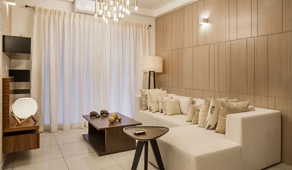 Representative impression of a naturally lit living room in a high-rise apartment