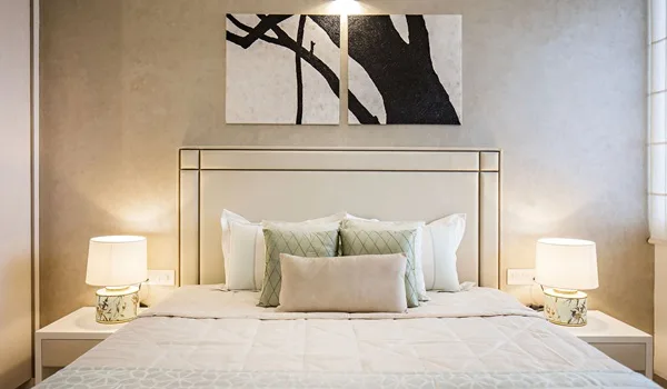 Representative impression of a master bedroom with wardrobe and balcony access in an apartment